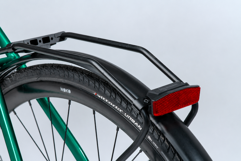Bicycle rear-view mirror mounted on a NOKO e-bike handlebar